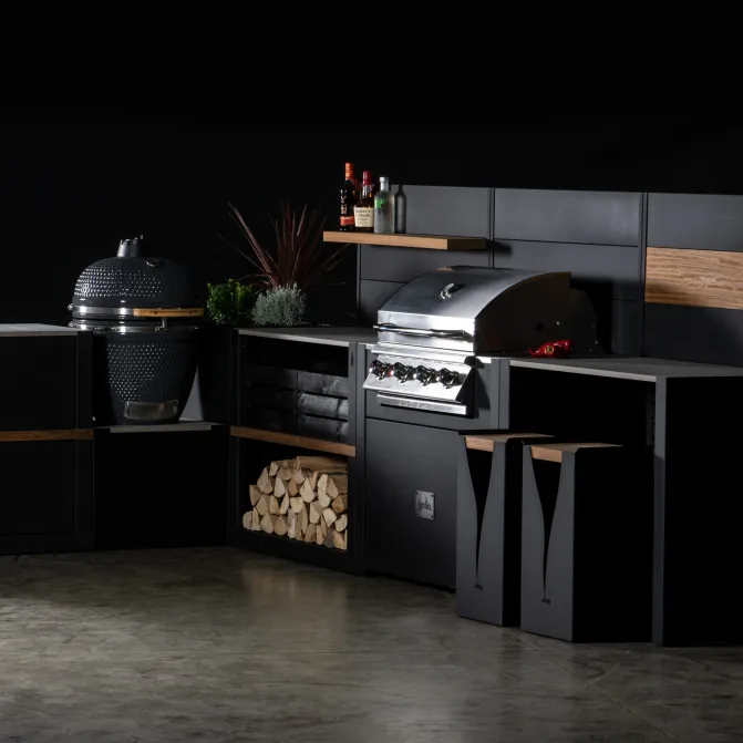 Outdoor kitchen with bar seating, BBQs, cabinets and log storage