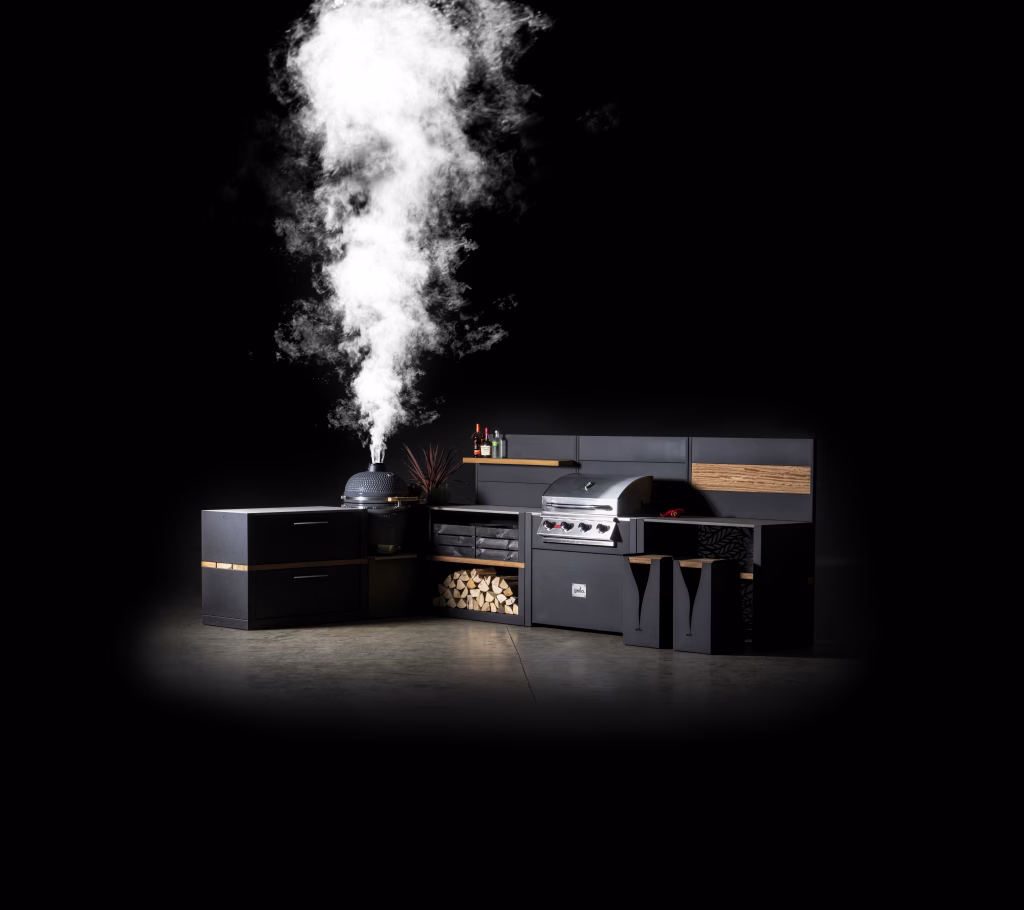 l0640 layout in studio with smoke coming out of Gusto charcoal bbq