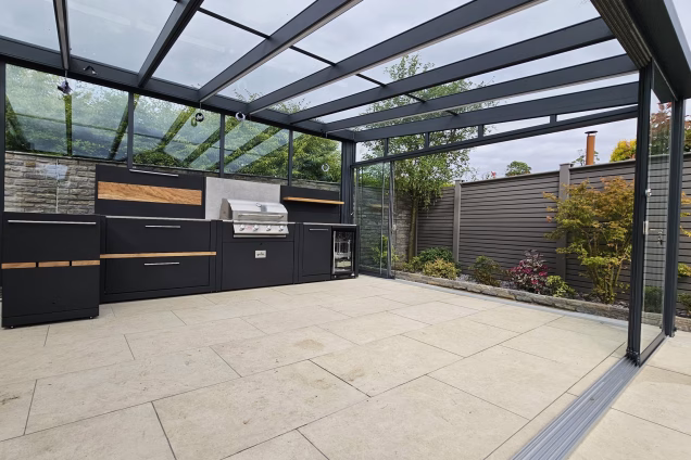 Outdoor Kitchen on patio in Stewarton, Ayrshire under glass pergola in garden