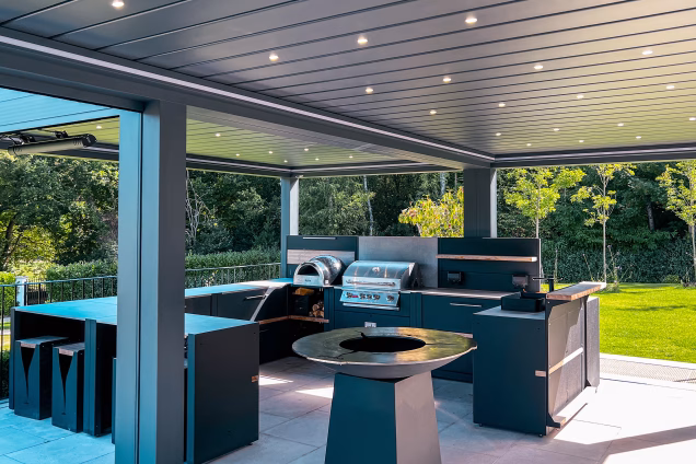 Outdoor kitchen in Runnymede, Surrey with u shaped kitchen with bbqs