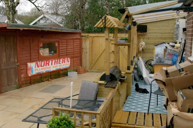 image of garden before being landscaped with a grillo kitchen