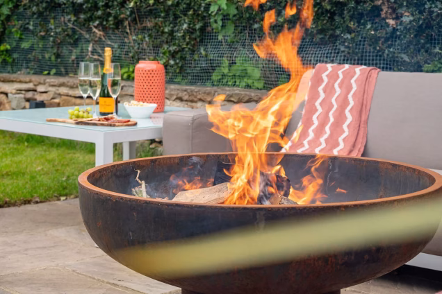 lit firepit in seating area