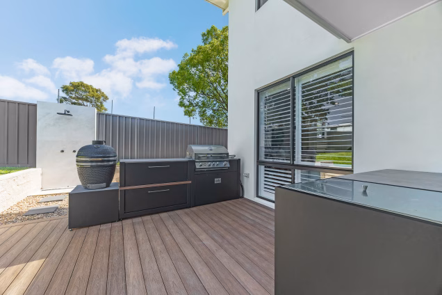 An outdoor kitchen area in the landscaped gardens of a property in Old Toongabbie, Sydney