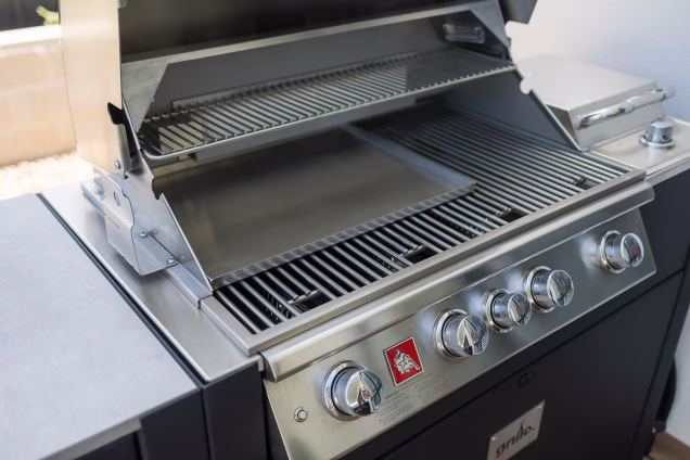 Closeup shot of the heavy duty stainless bbq grates and grillplate in a Bull Angus BBQ in an outdoor kitchen in Sydney