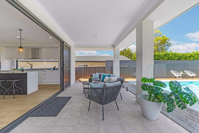 A view along the alfresco area and into the kitchen of a refurbished property in Old Toongabbie, Sydney