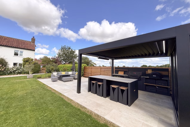 Photo of an outdoor kitchen in Attleborough with a mid-19th century cottage in the background