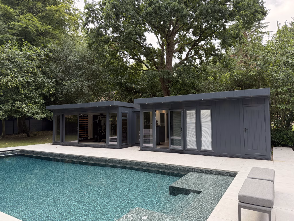 garden buildings next to pool in large patioed garden