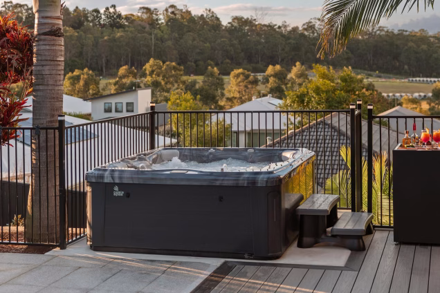 hot tub on decking in garden terrace