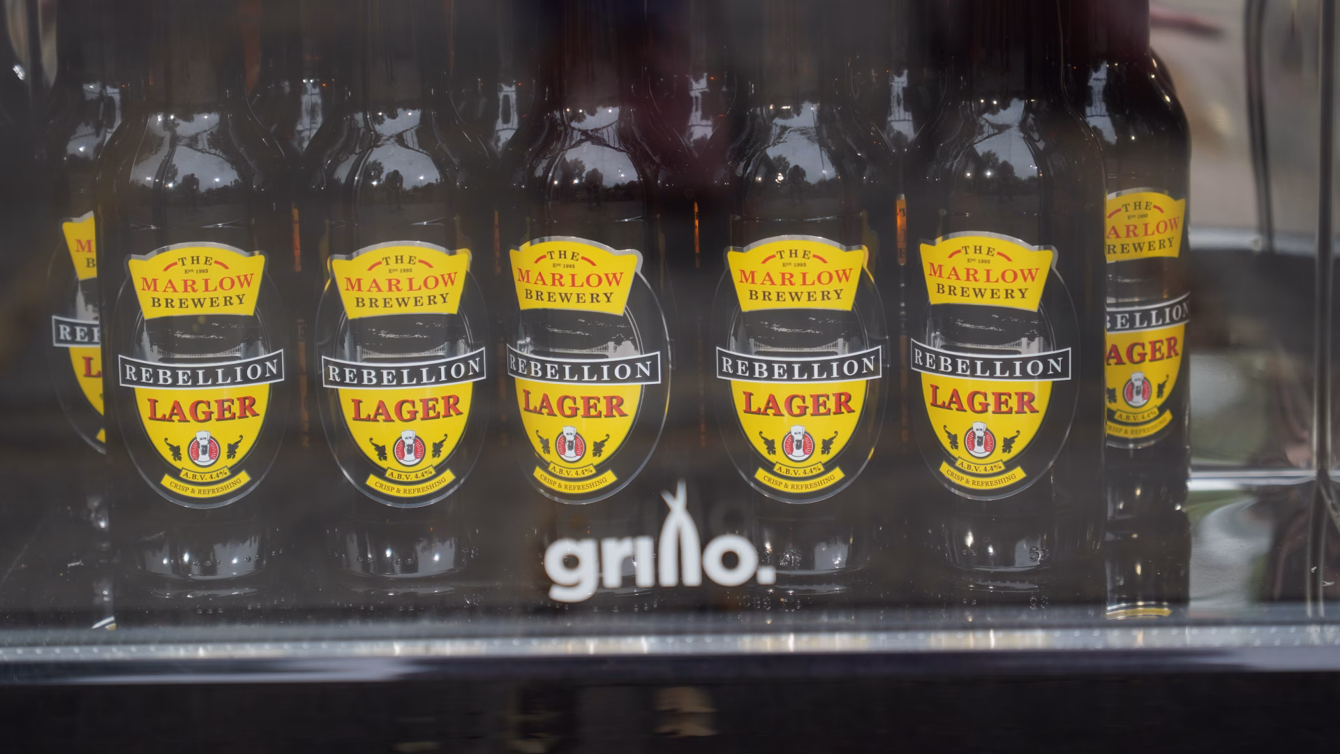 closeup of beers in drinks fridge