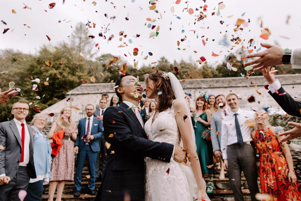 bride and groom with confetti