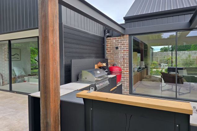 A photo showing the view over the standing bar of a Grillo kitchen at a contemporary house in Moss Vale