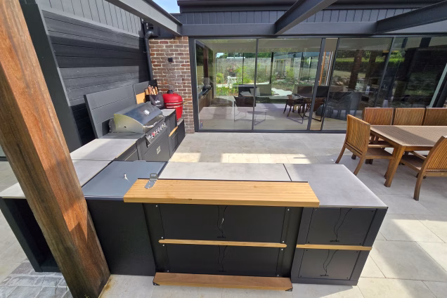 A Grillo kitchen in Moss Vale with a standing bar section that features a solid iroko footrail