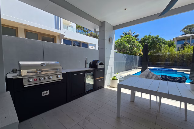 A view from the alfresco and outdoor dining area of a property in Burraneer, looking towards the pool