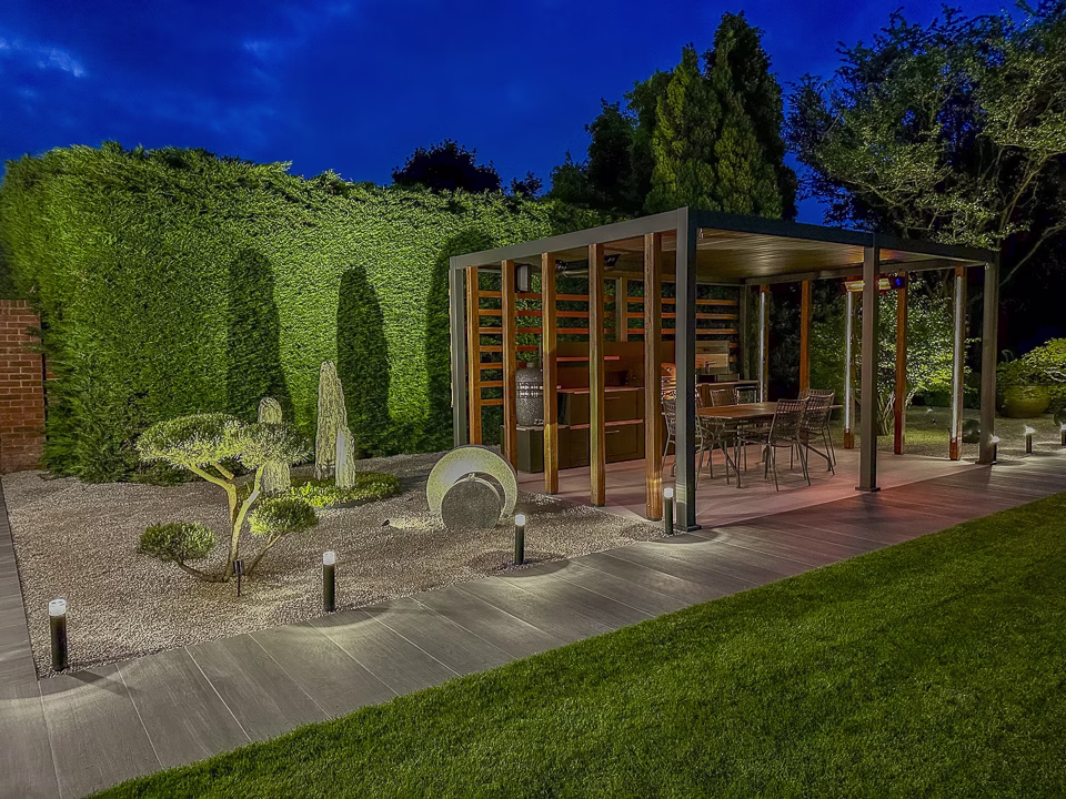 Grillo outdoor kitchen on a patio framed by a pergola