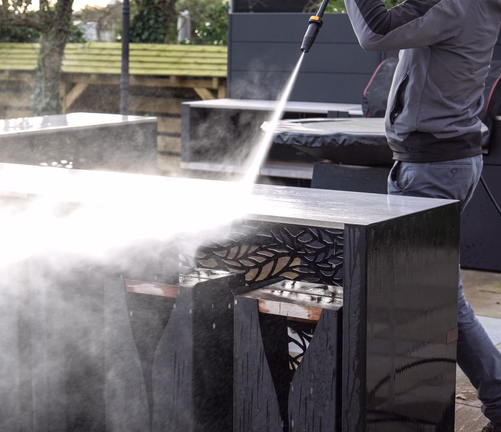 A Grillo Vantage outdoor kitchen being pressure washed, for easy cleaning
